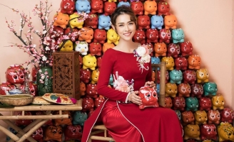 Diệp Bảo Ngọc khoe dáng trong áo dài của NTK Minh Châu